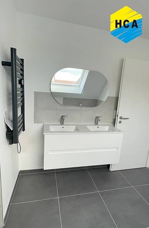 Installation d'un meuble double vasque et sèche serviette pour une salle de bain à Schnersheim en périphérie de Strasbourg